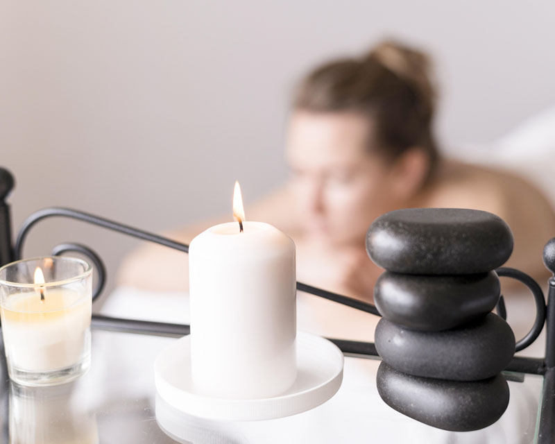 blurred-woman-massage-table